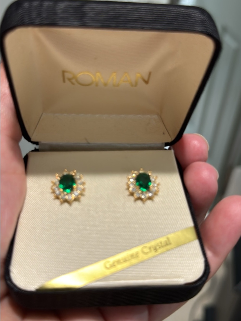 Brand new, never worn Roman brand genuine crystal stud earrings in original box.